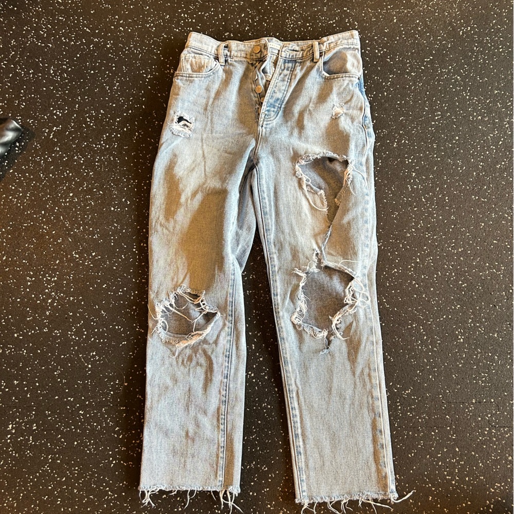 Distressed light wash jeans